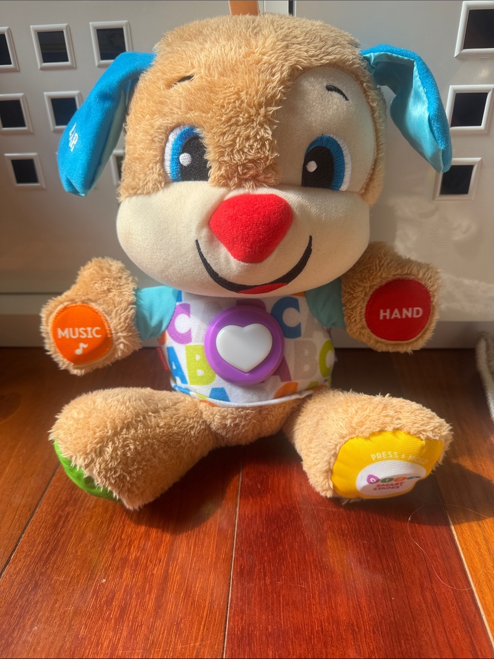 Fisher-Price Brown Plush Learning Puppy with Red Nose and Blue Ears